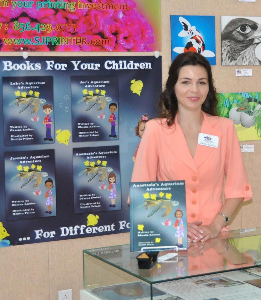 Author and mom reading a magical storybook to her child